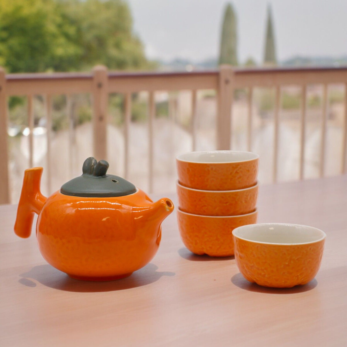 Conjunto de Bule Laranja com Quatro Chávenas
