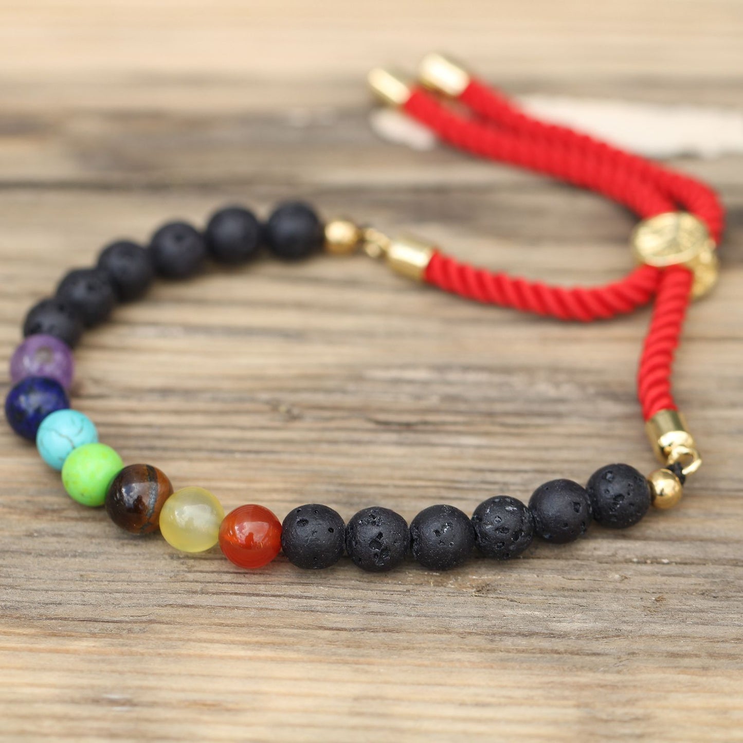 Pulseira de Pedra Vulcânica e Chakras Ajustável